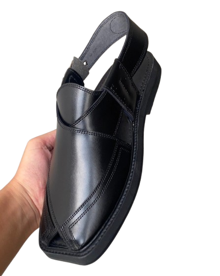 Handmade traditional Peshawari chappal for men held in hand side view