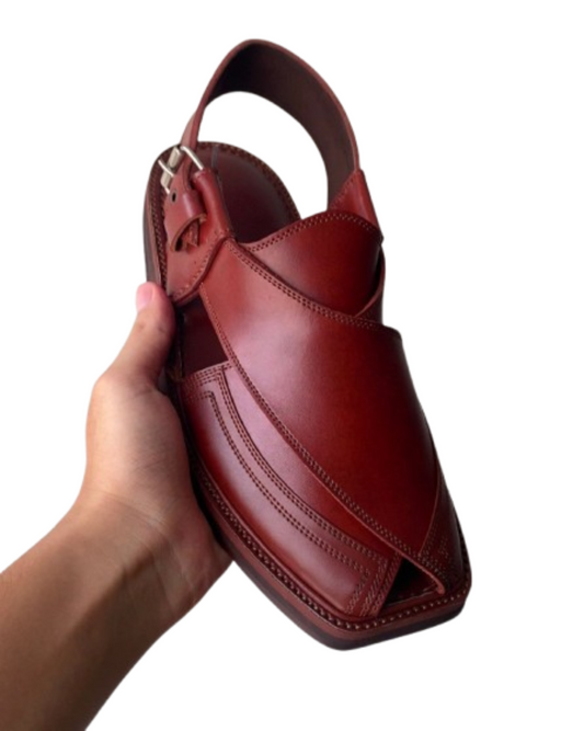 Handmade traditional Peshawari chappal for men held in hand side view