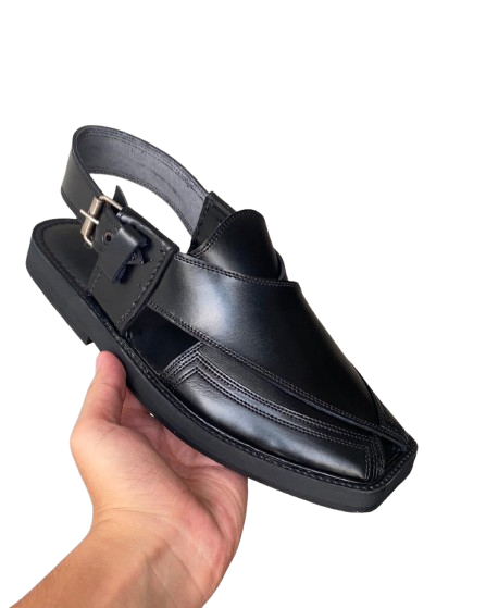 Handmade traditional Peshawari chappal for men held in hand side view